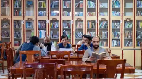 Afghanistan's rulers outlaw textbooks produced by women from the nation's higher education institutions